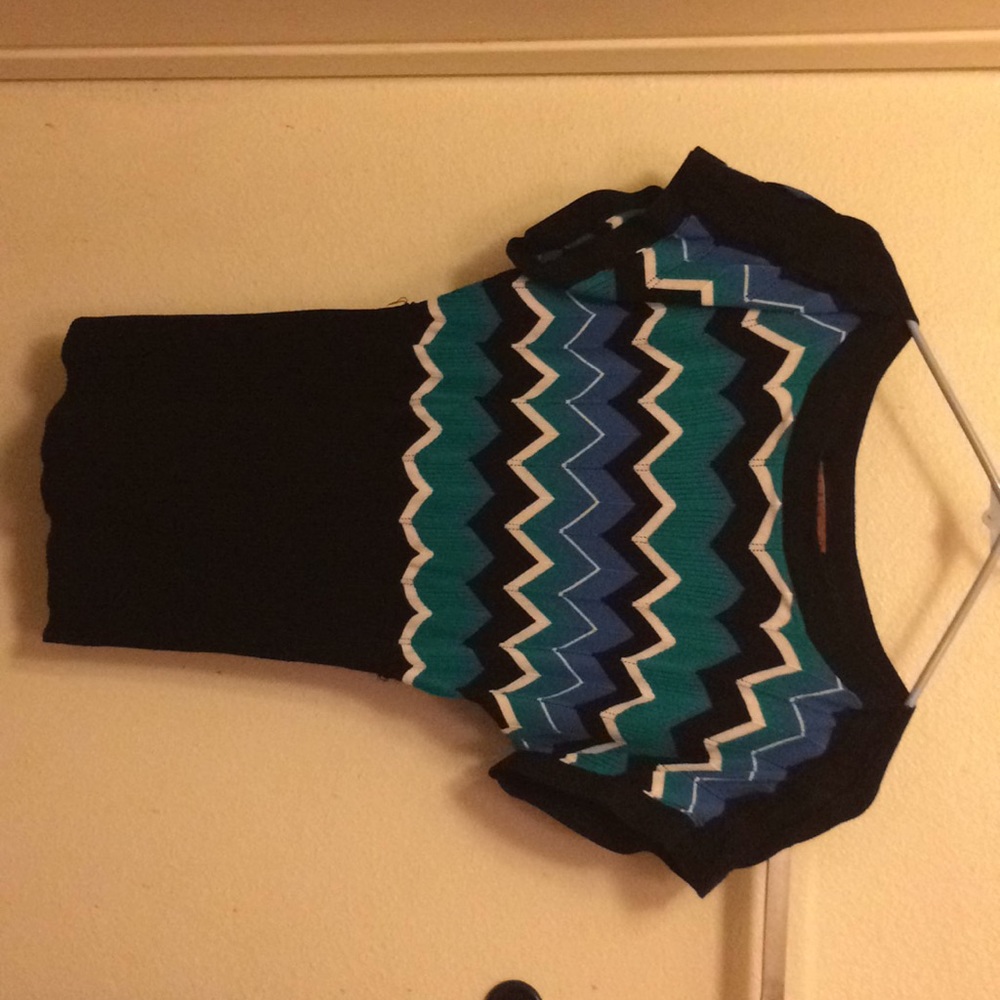 Like new! Belladini girls shirt size M.